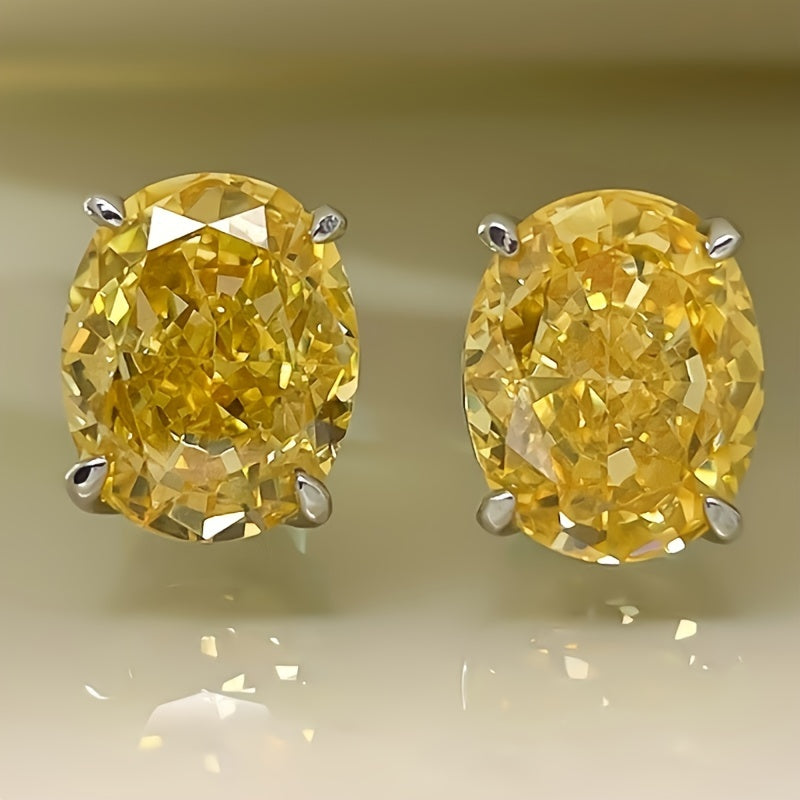 Boucles d'oreilles intemporelles en or blanc et oxyde de zirconium