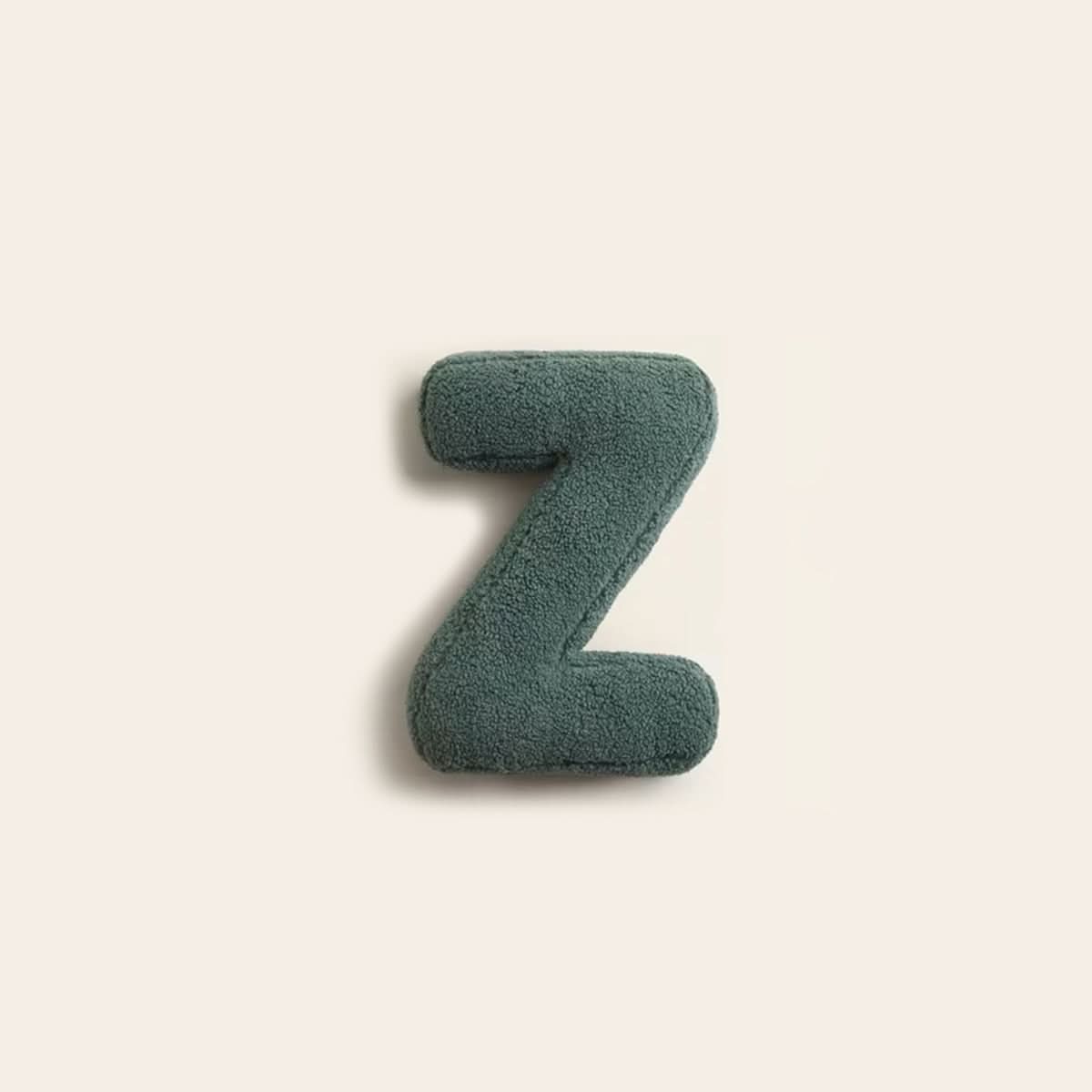 Coussin lettre personnalisée pour canapé