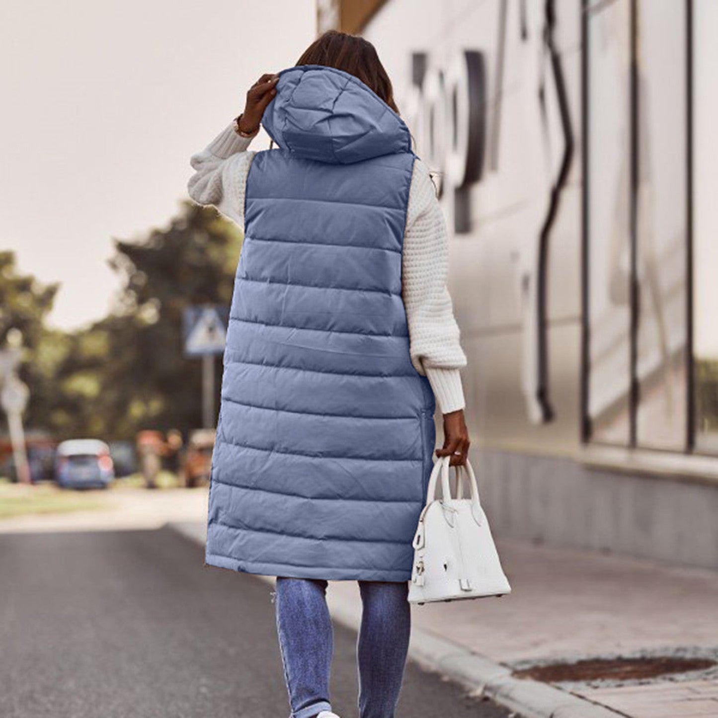 Gilet matelassé à capuche pour femme