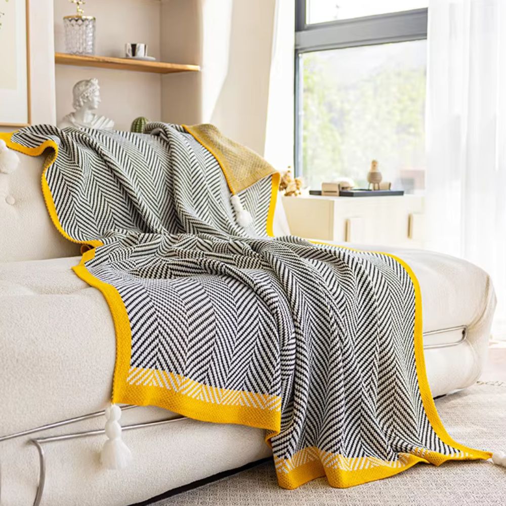 Plaid luxueux à motif chevron doré