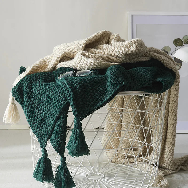 Plaid tricoté en laine avec franges