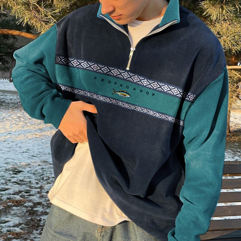 Pull moderne à col montant et demi-zip