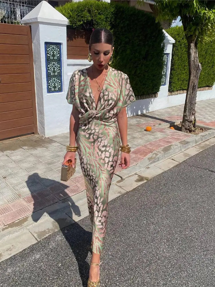 Robe midi élégante pour femme avec col en V et détail noué