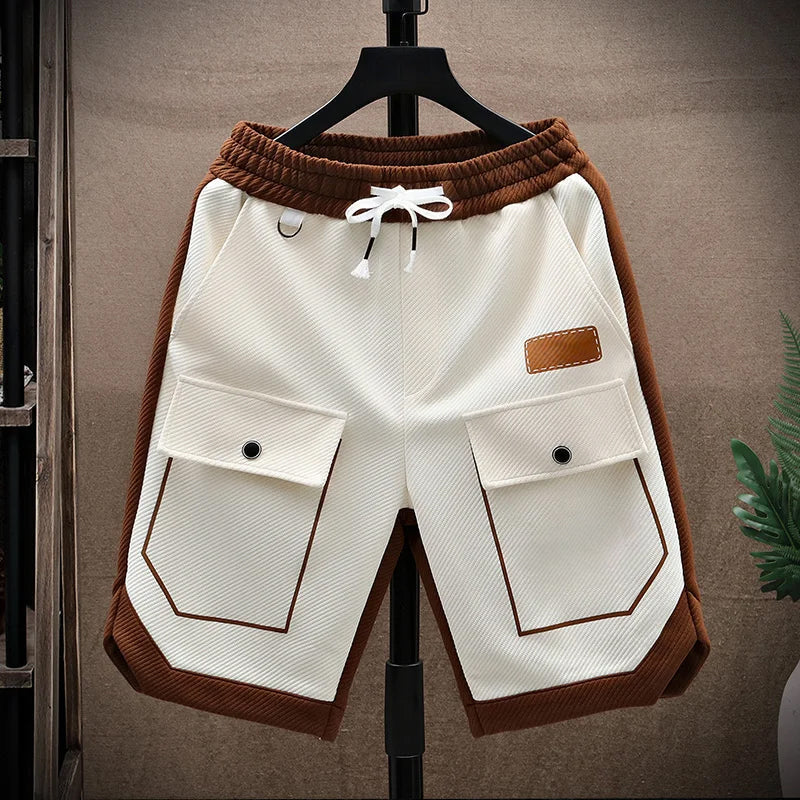 Short cargo homme coupe ample avec panneaux contrastants et cordon de serrage à la taille
