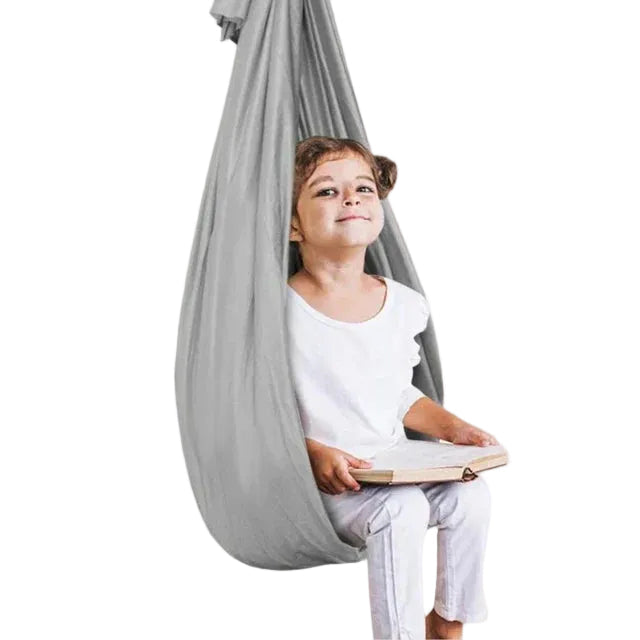 Balançoire thérapeutique pour enfants – jeu sensoriel et relaxation