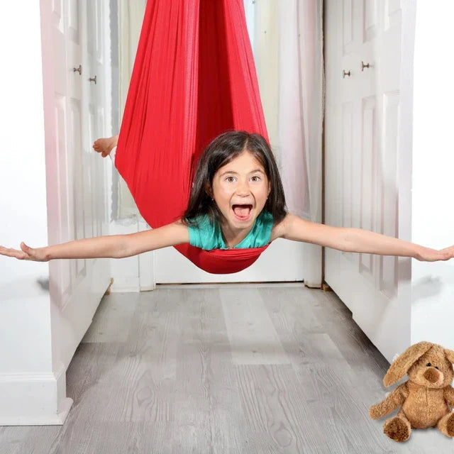 Balançoire thérapeutique pour enfants – jeu sensoriel et relaxation