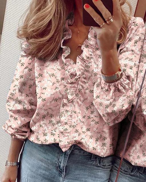 Blouse femme à volants et manches longues