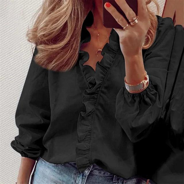 Blouse femme à volants et manches longues