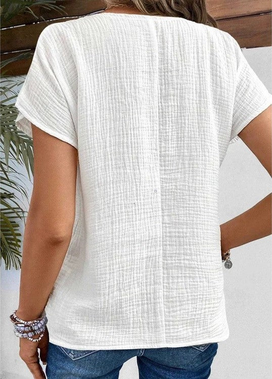Blouse structurée à patte de boutonnage pour femme