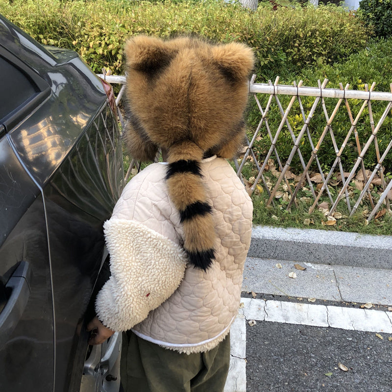 Bonnet d'hiver en fourrure avec pompons