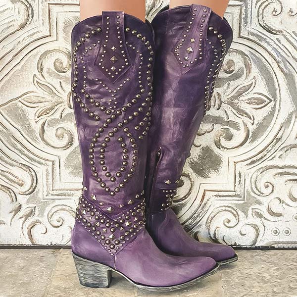 Bottes hautes de style western avec détails cloutés