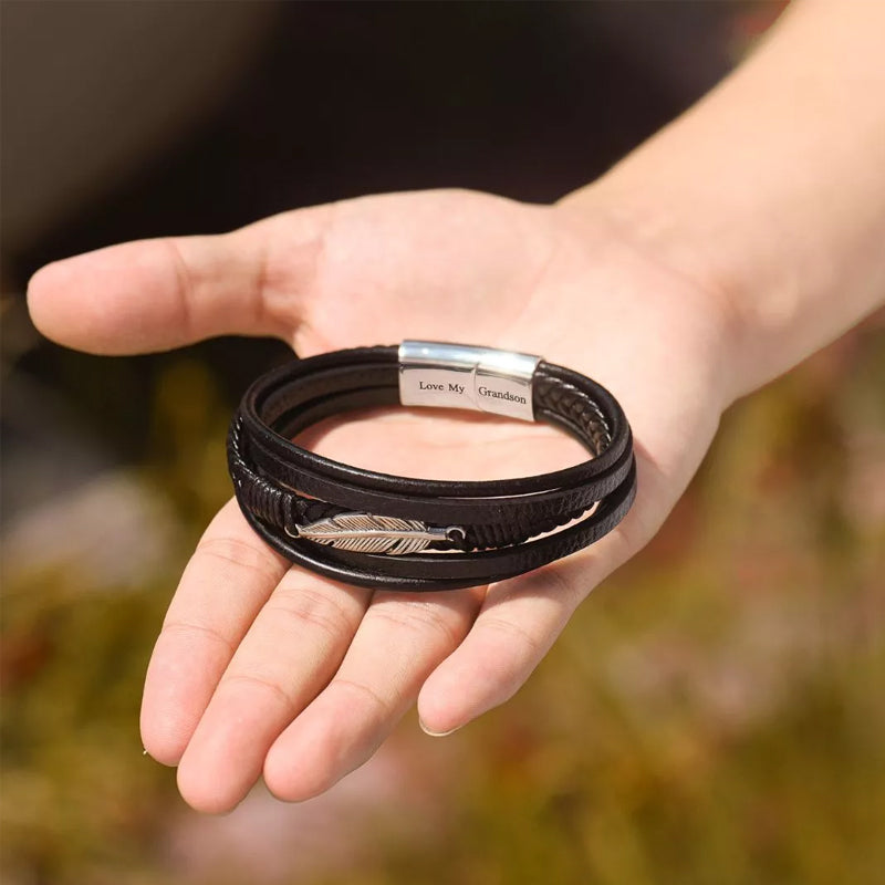 Bracelet avec motif plume et acier