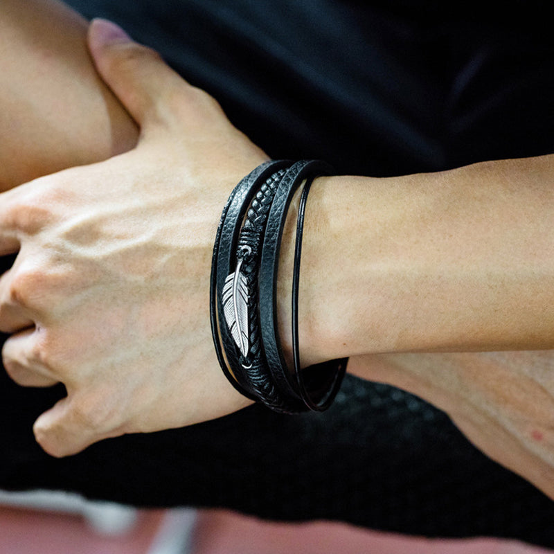 Bracelet avec motif plume et acier