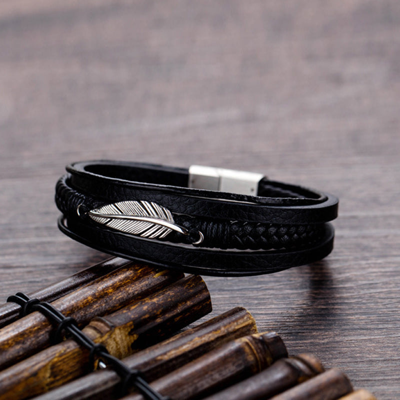 Bracelet avec motif plume et acier