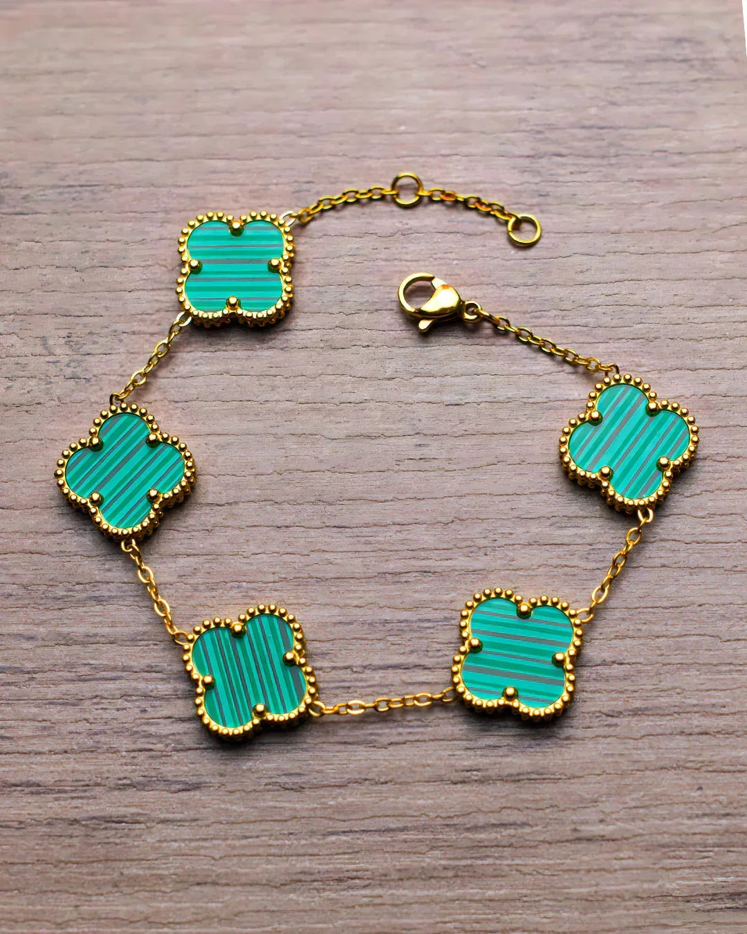 Bracelet doré à trèfles