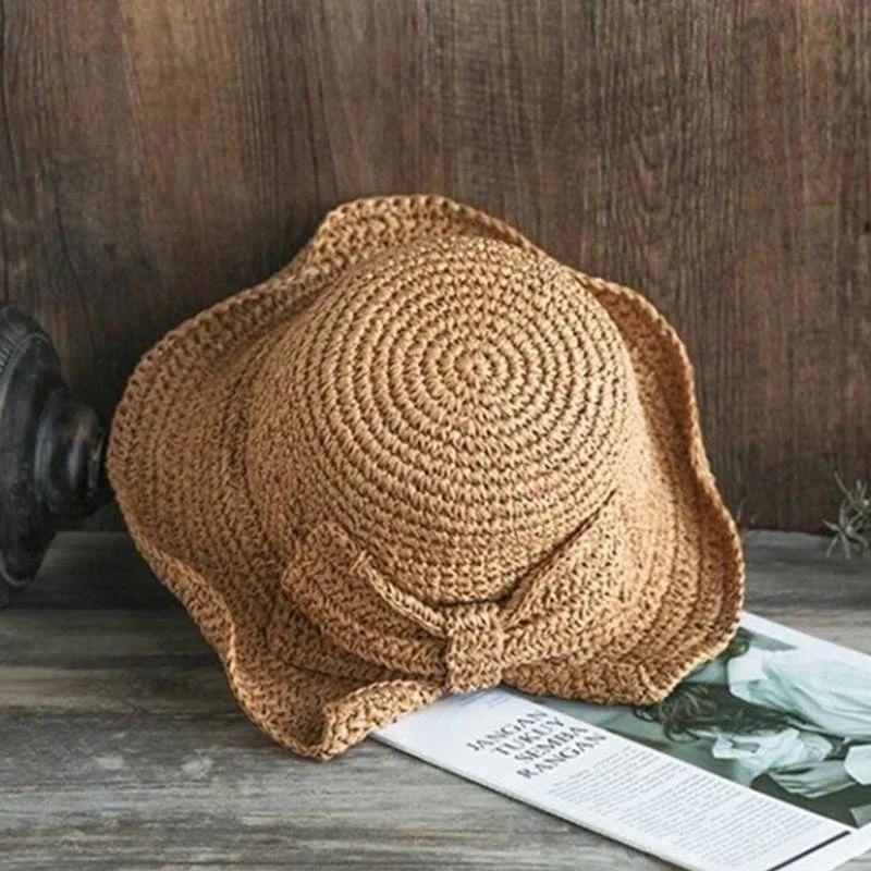 Chapeau d'été à bords et nœud