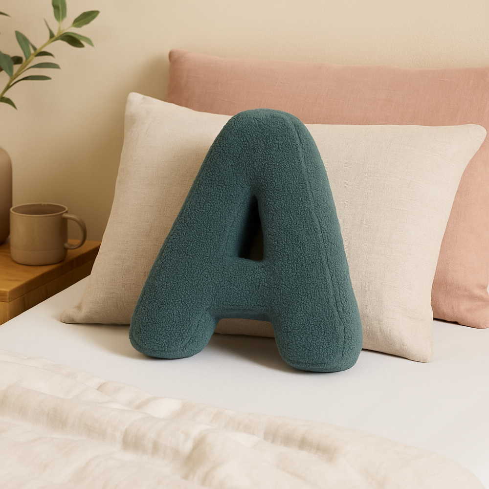 Coussin lettre personnalisée pour canapé