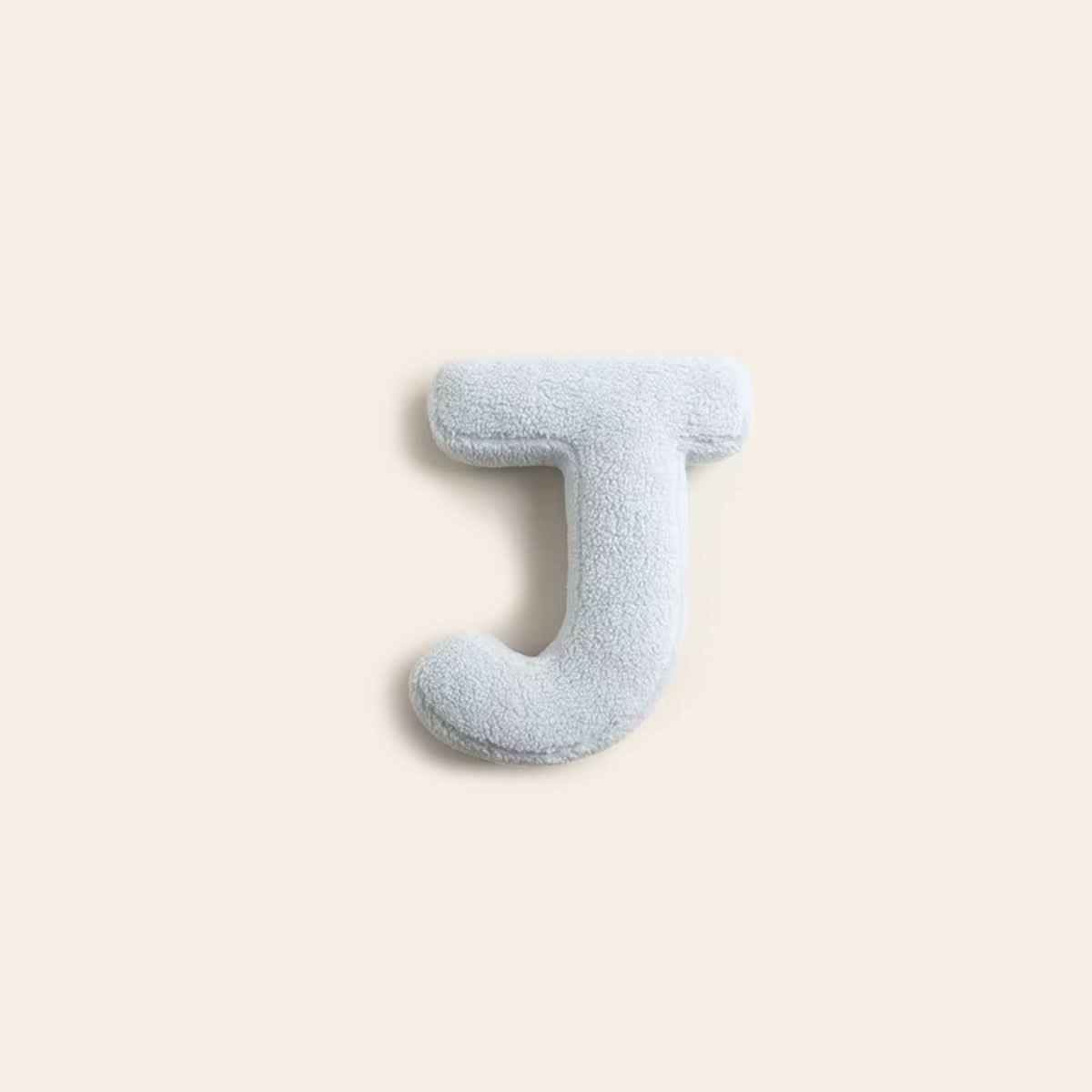 Coussin lettre personnalisée pour canapé