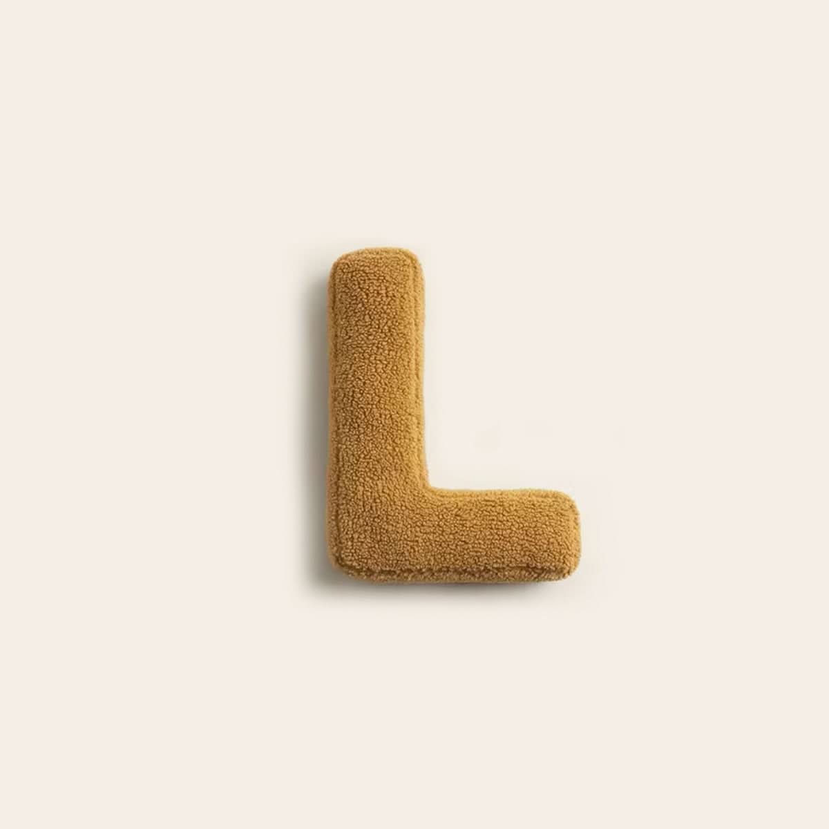 Coussin lettre personnalisée pour canapé