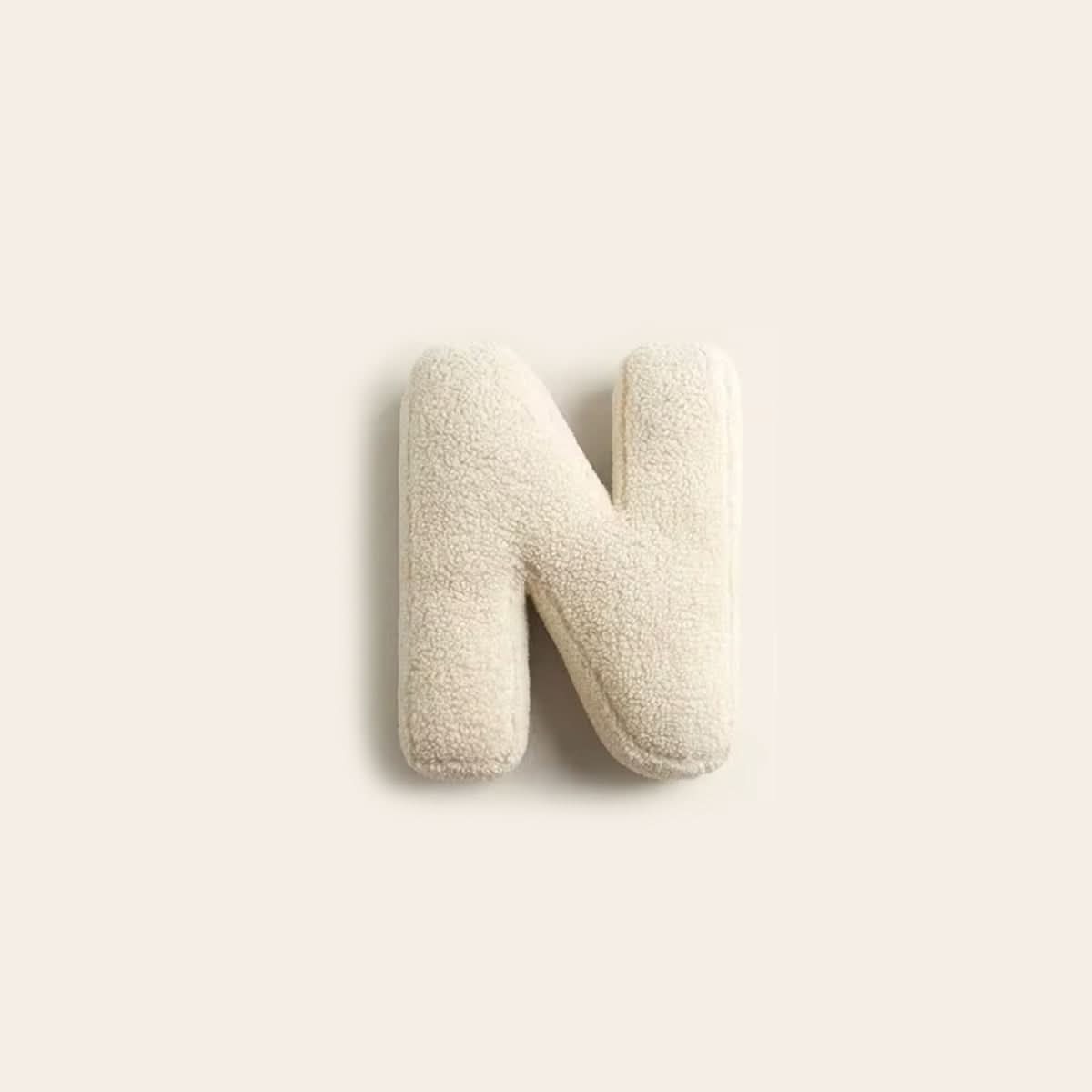 Coussin lettre personnalisée pour canapé