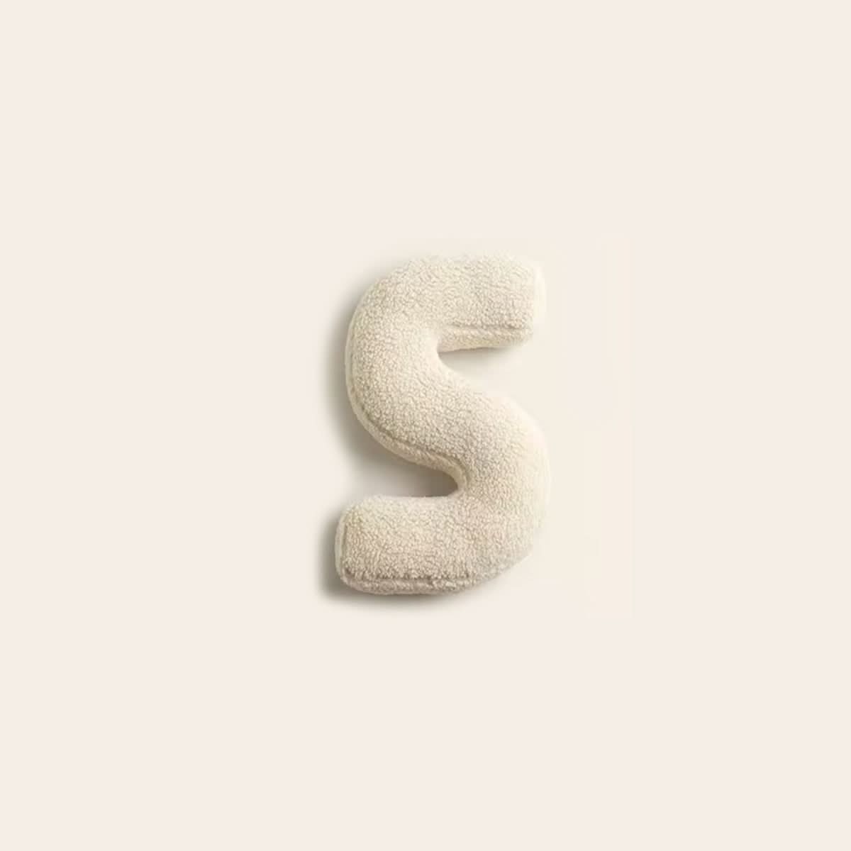 Coussin lettre personnalisée pour canapé
