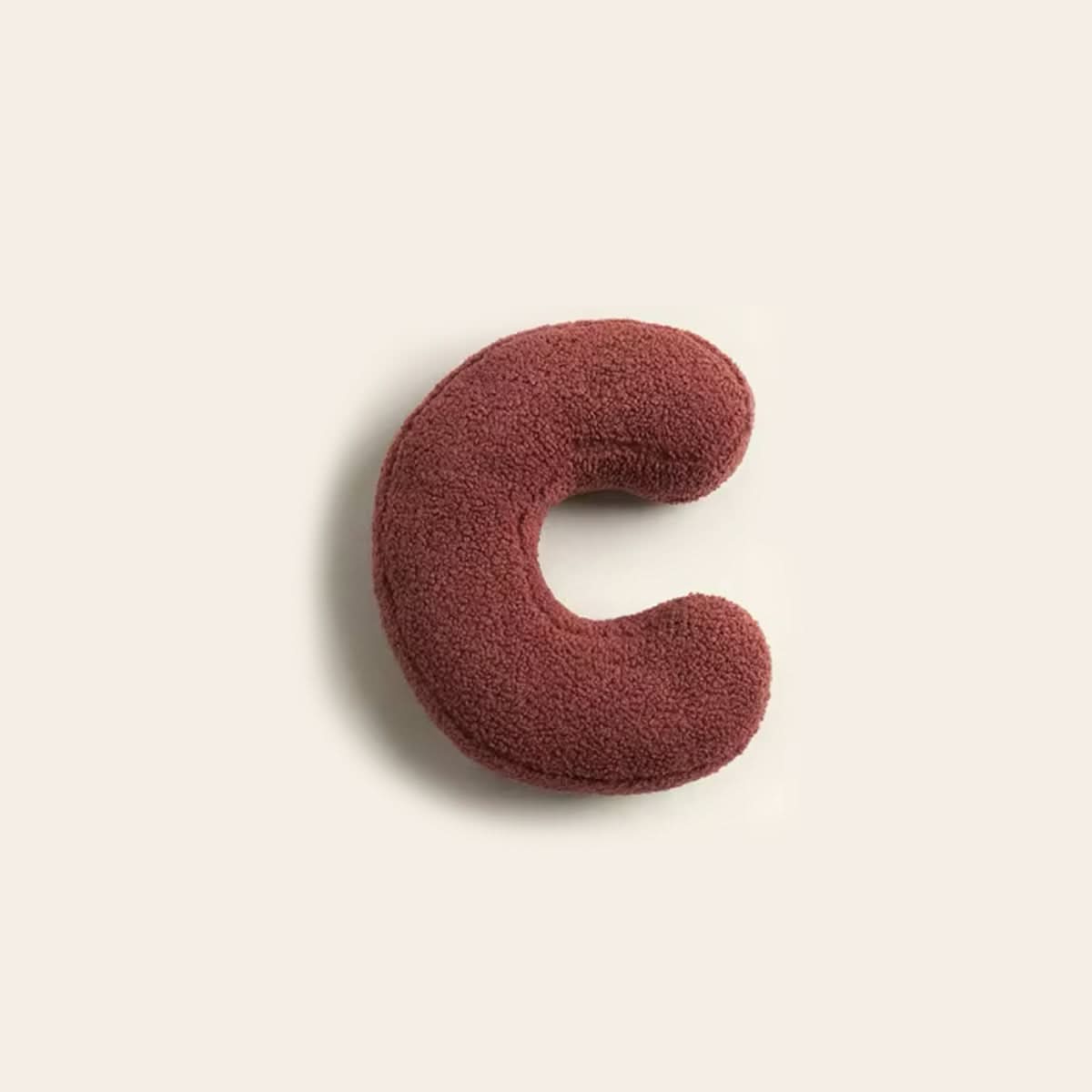 Coussin lettre personnalisée pour canapé