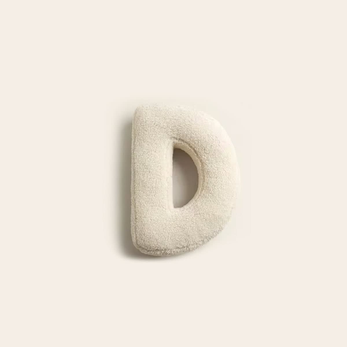 Coussin lettre personnalisée pour canapé