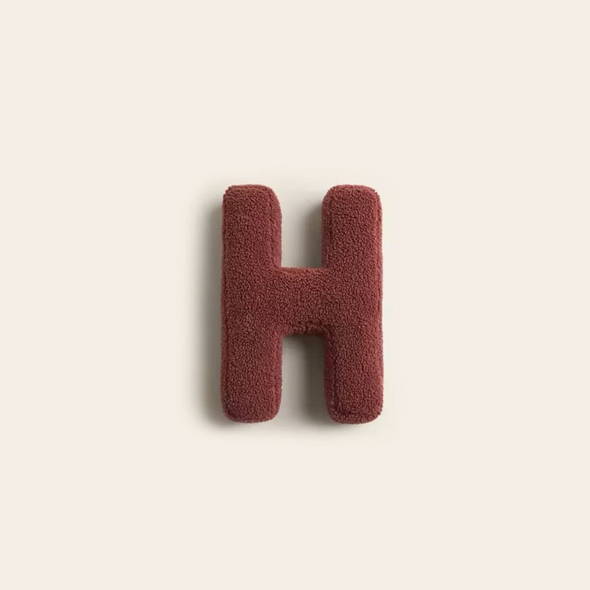 Coussin lettre personnalisée pour canapé