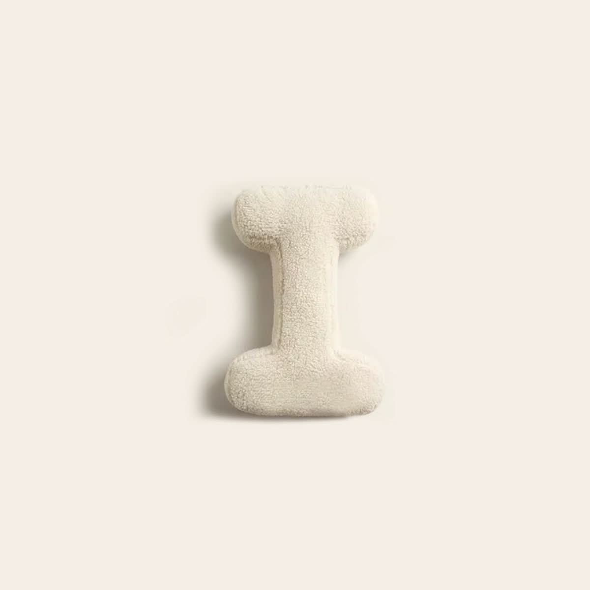 Coussin lettre personnalisée pour canapé
