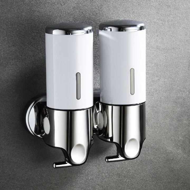 Distributeur de savon mural en acier inoxydable au design élégant