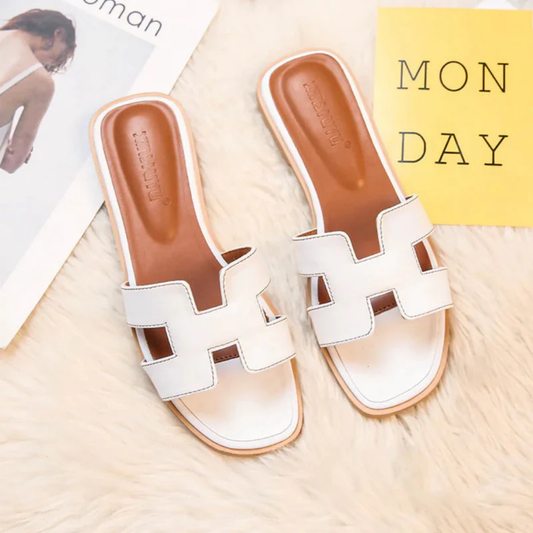 Élégantes mules femme avec motif H