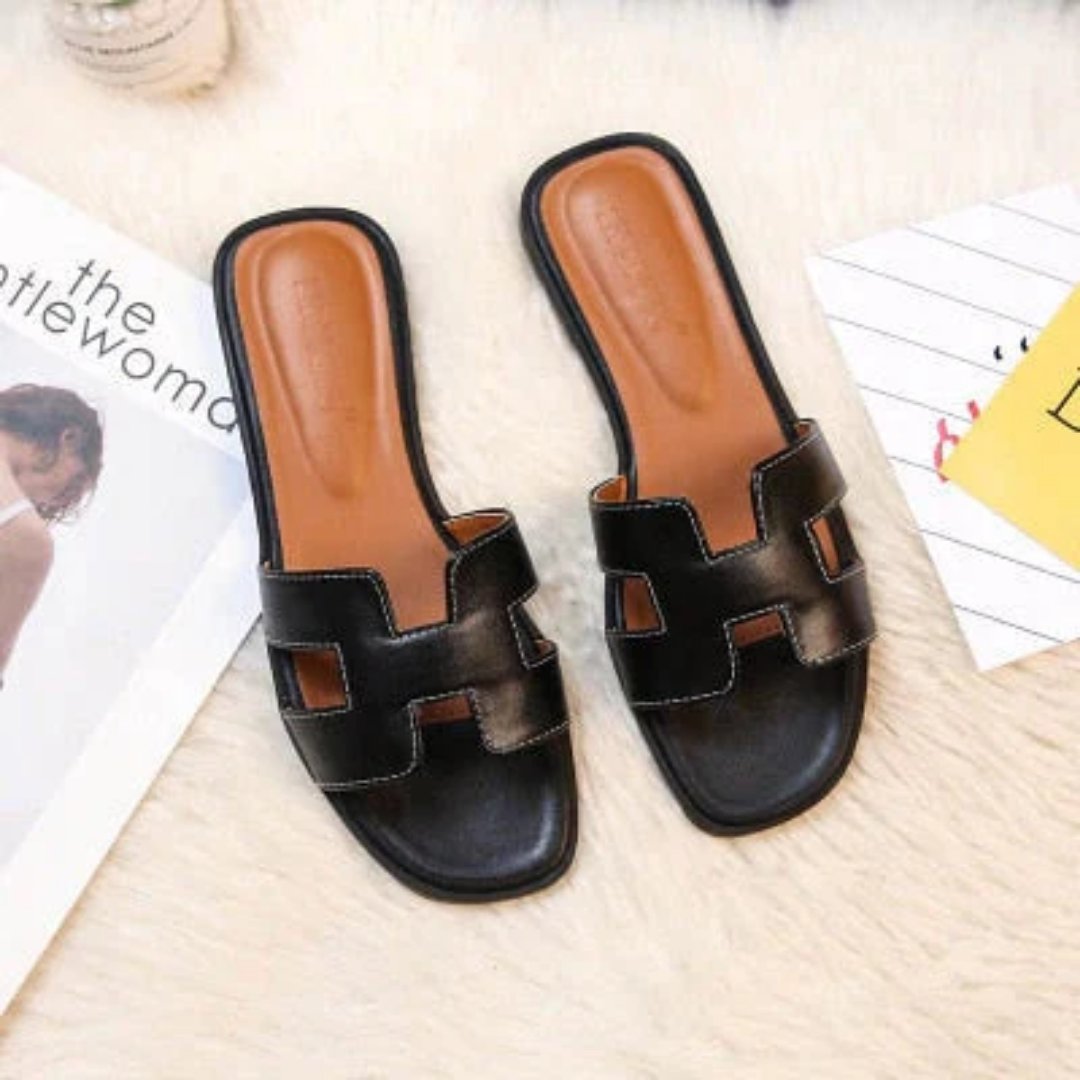 Élégantes mules femme avec motif H