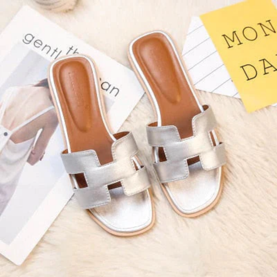 Élégantes mules femme avec motif H