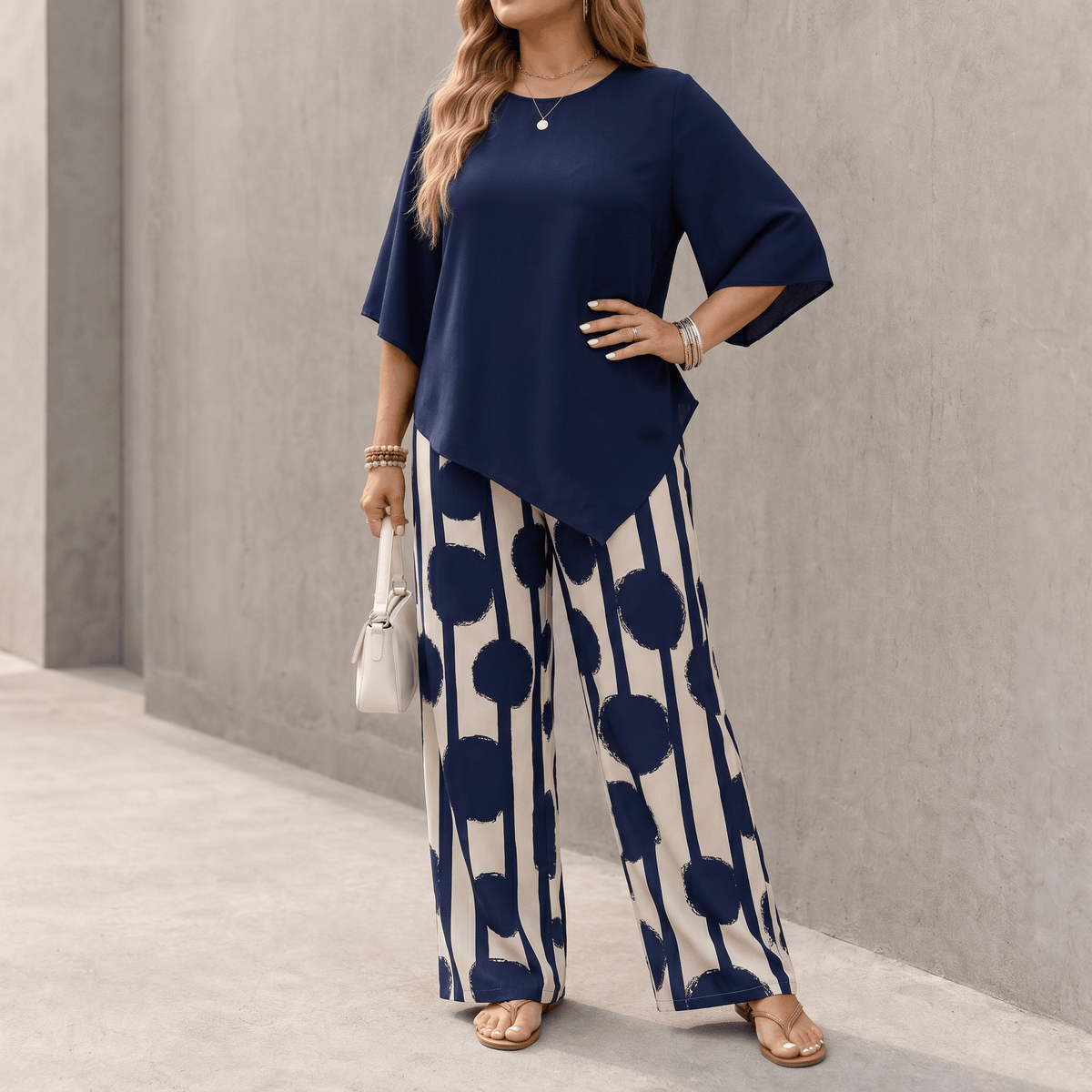 Ensemble 2 pièces avec haut drapé asymétrique et pantalon imprimé large