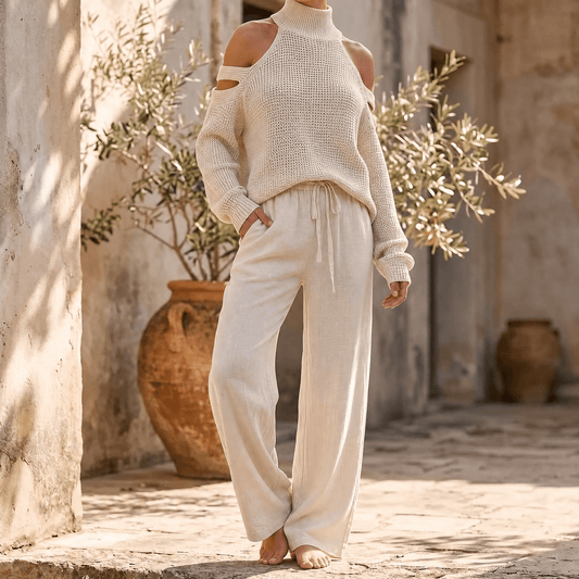 Ensemble pour femme avec pull en maille à épaules dénudées et pantalon fluide