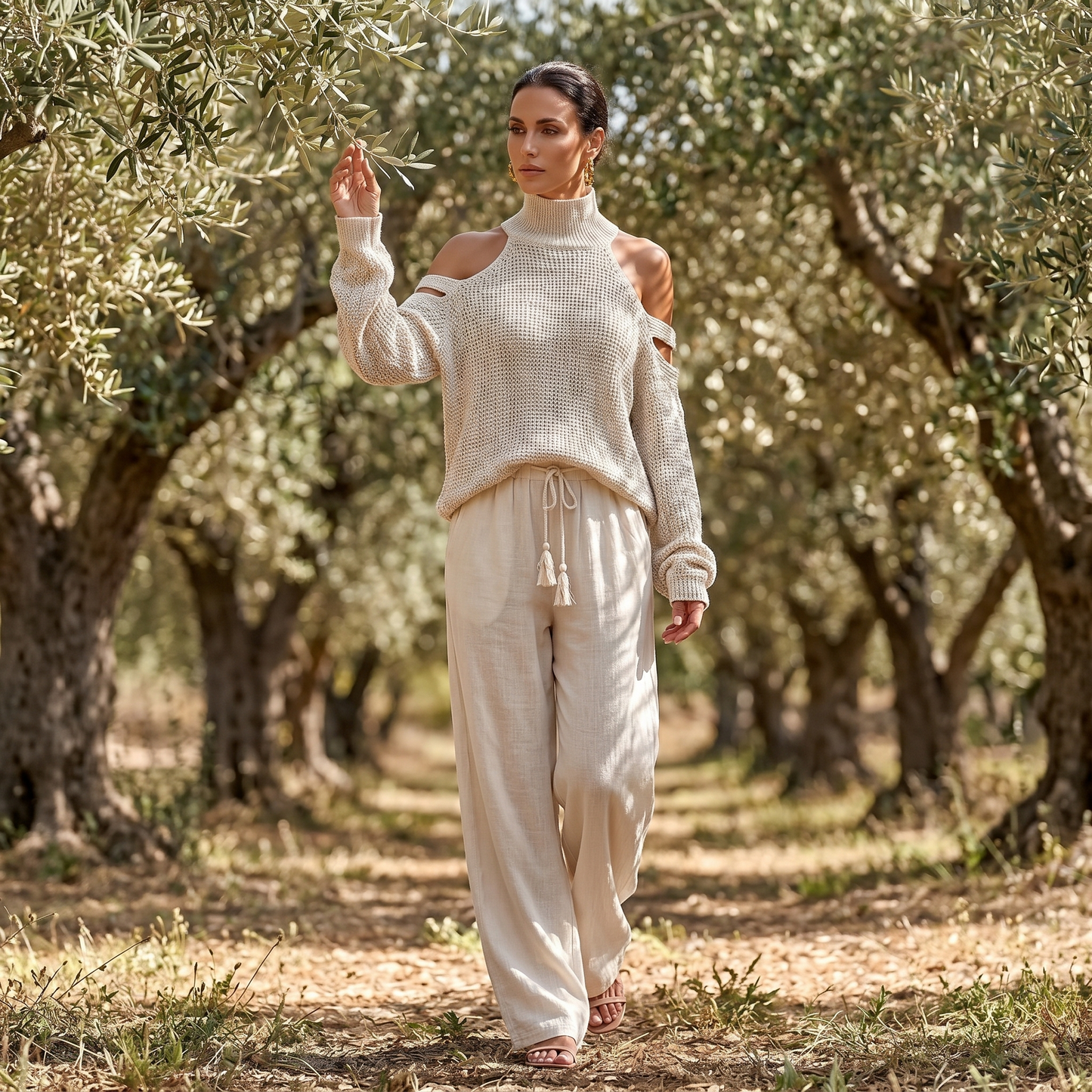 Ensemble pour femme avec pull en maille à épaules dénudées et pantalon fluide