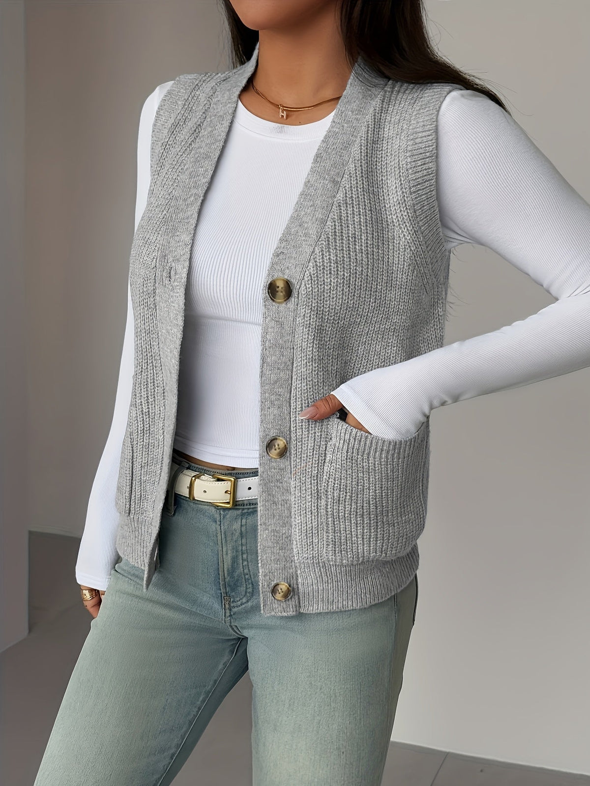 Gilet sans manches boutonné en maille à col en V
