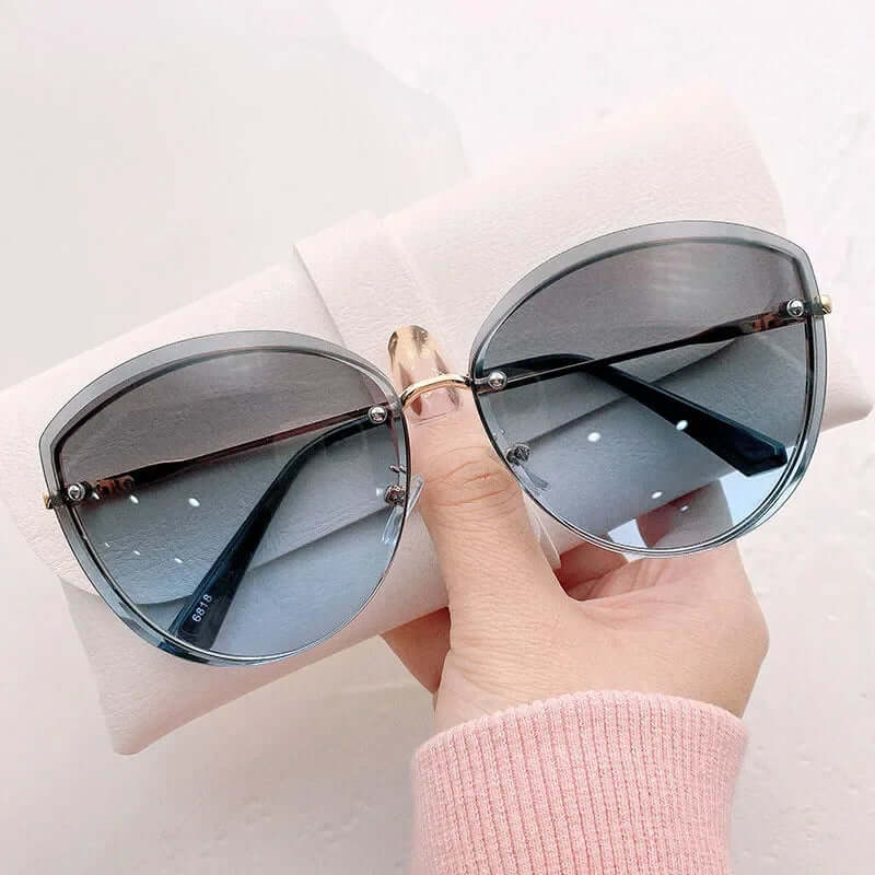 Lunettes de soleil femme, monture oeil de chat sans monture UV400