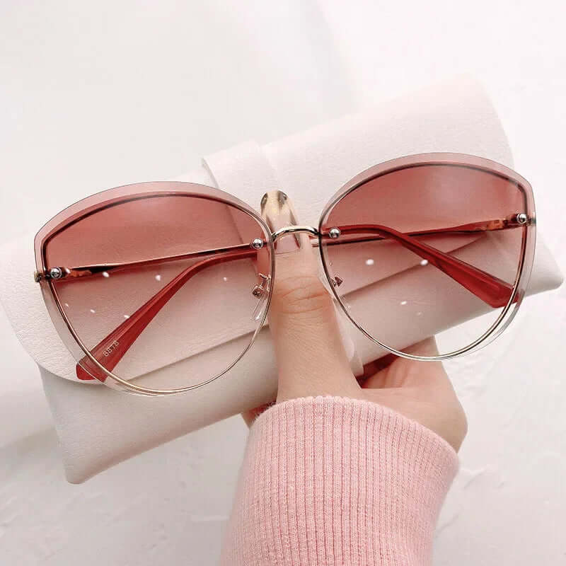 Lunettes de soleil femme, monture oeil de chat sans monture UV400