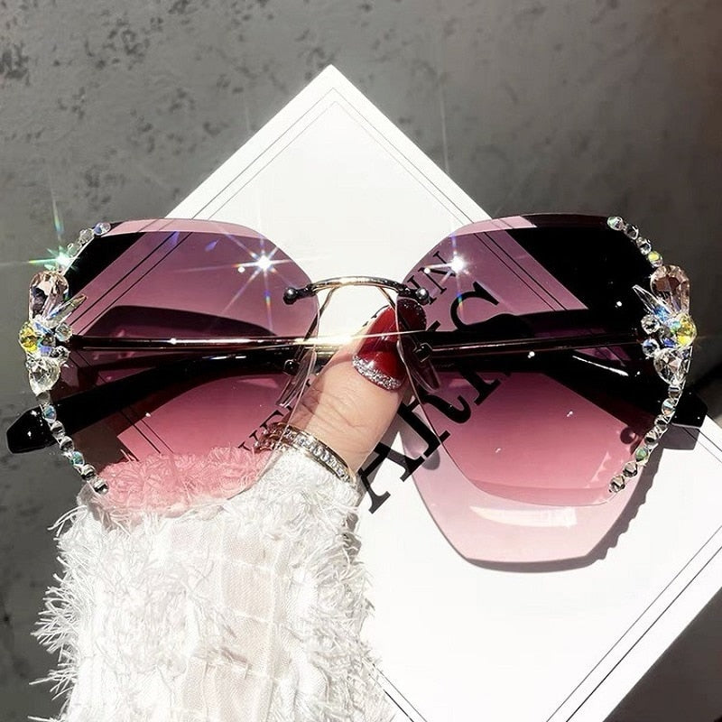 Lunettes de soleil sans monture ornées de strass