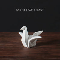 Estatua de pájaro de cerámica inspirada en origami