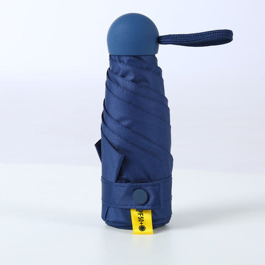Parapluie de poche forme capsule avec protection solaire UPF50