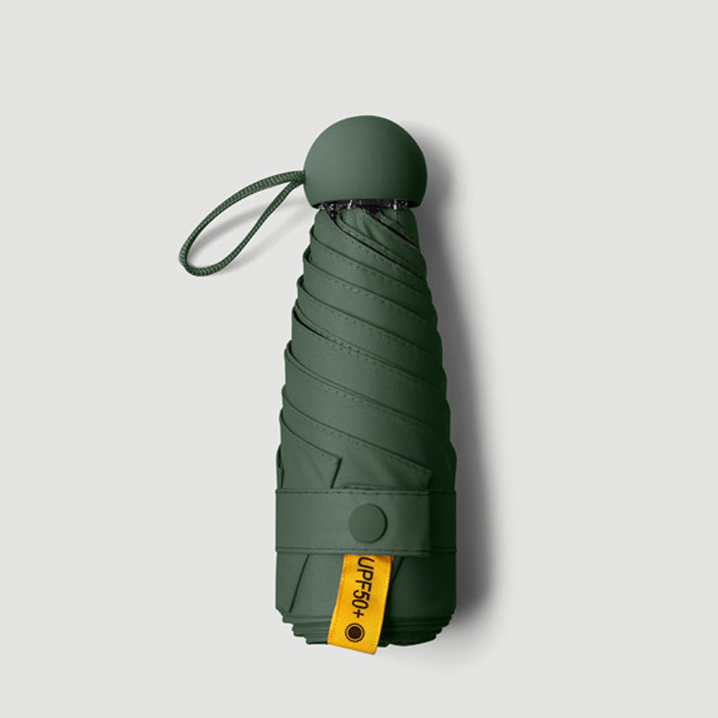 Parapluie de poche forme capsule avec protection solaire UPF50