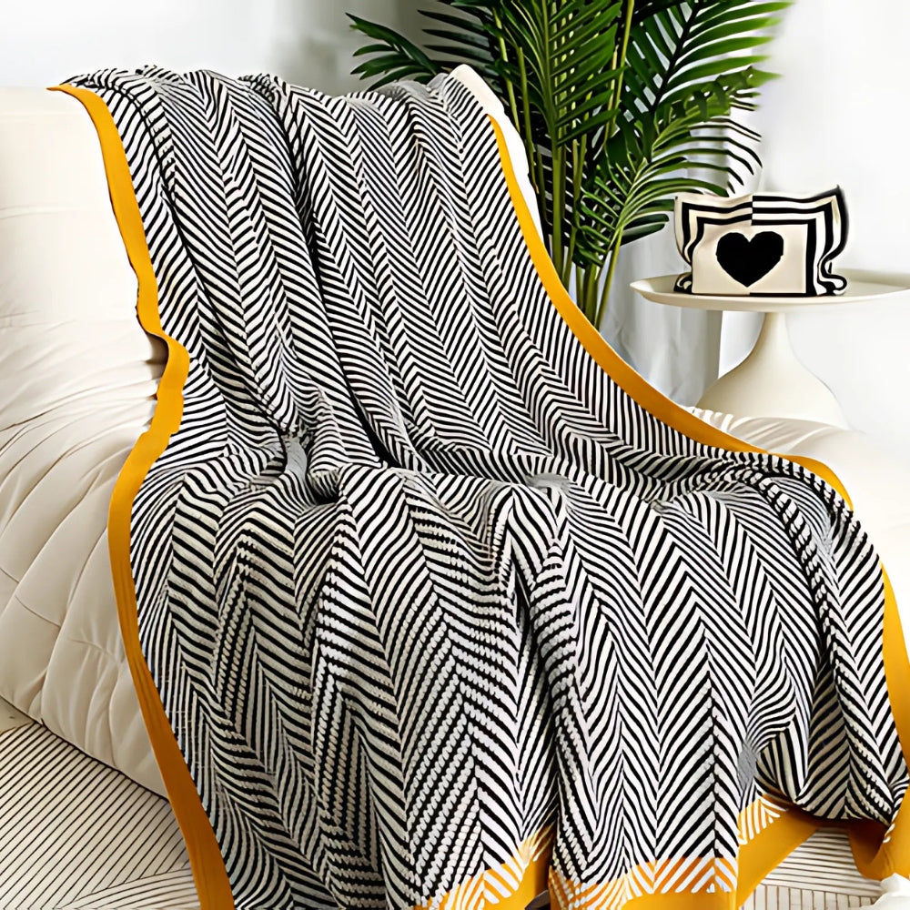 Plaid luxueux à motif chevron doré