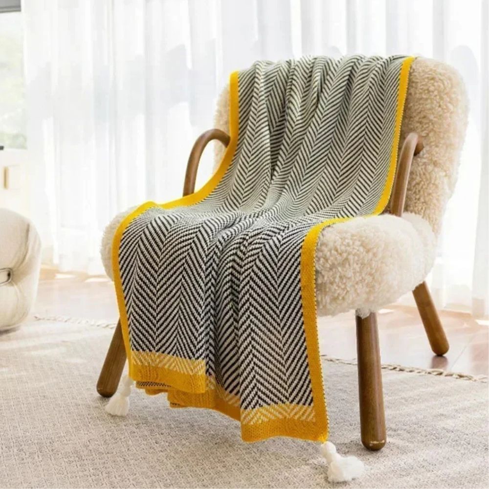Plaid luxueux à motif chevron doré