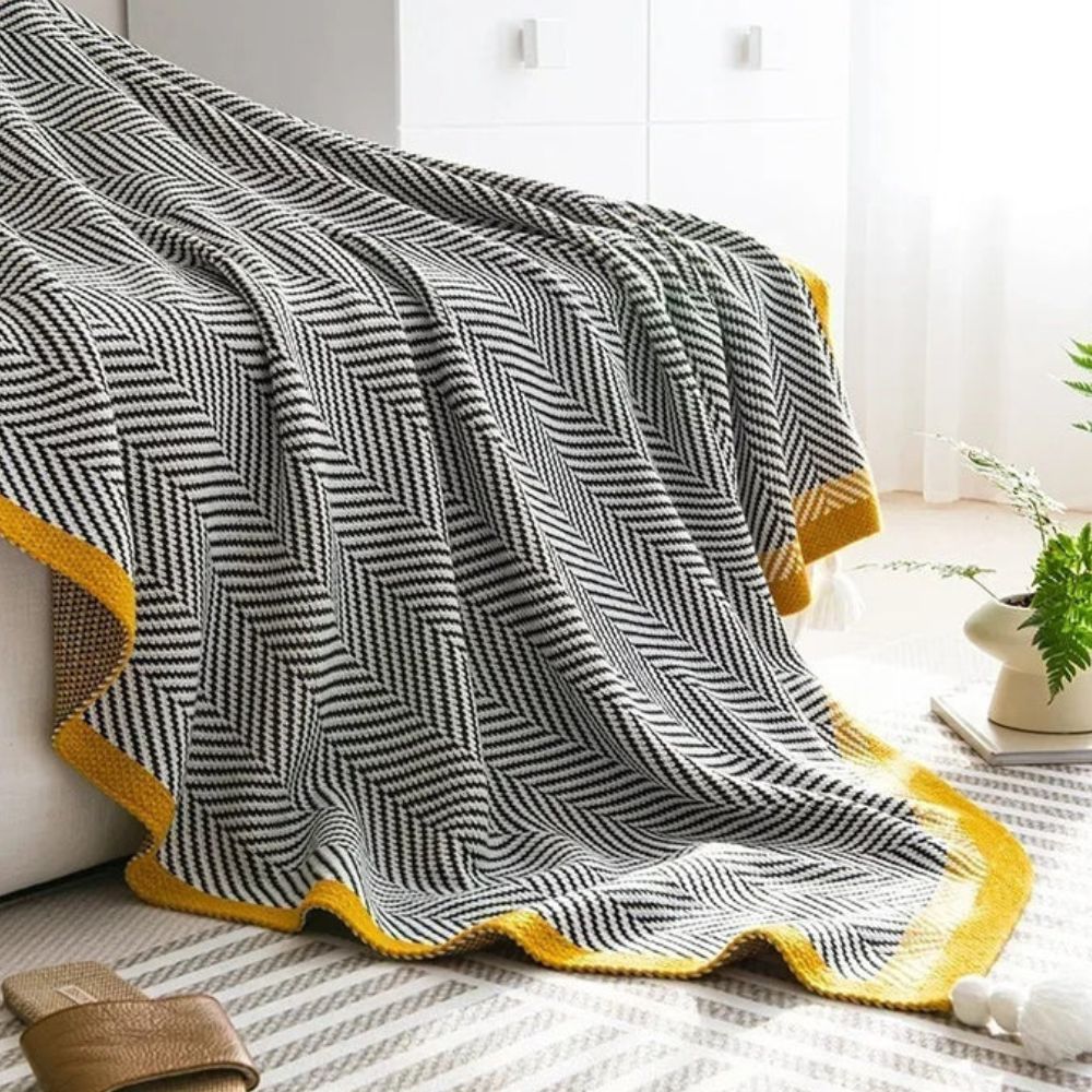 Plaid luxueux à motif chevron doré
