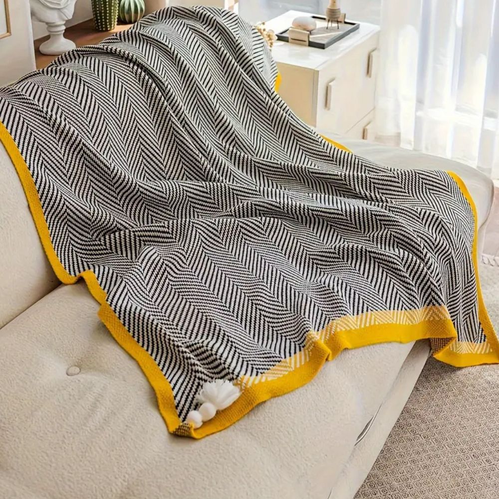 Plaid luxueux à motif chevron doré
