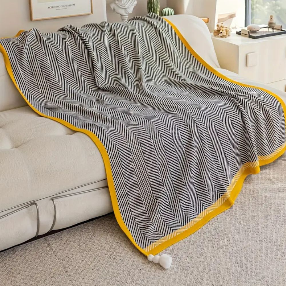 Plaid luxueux à motif chevron doré