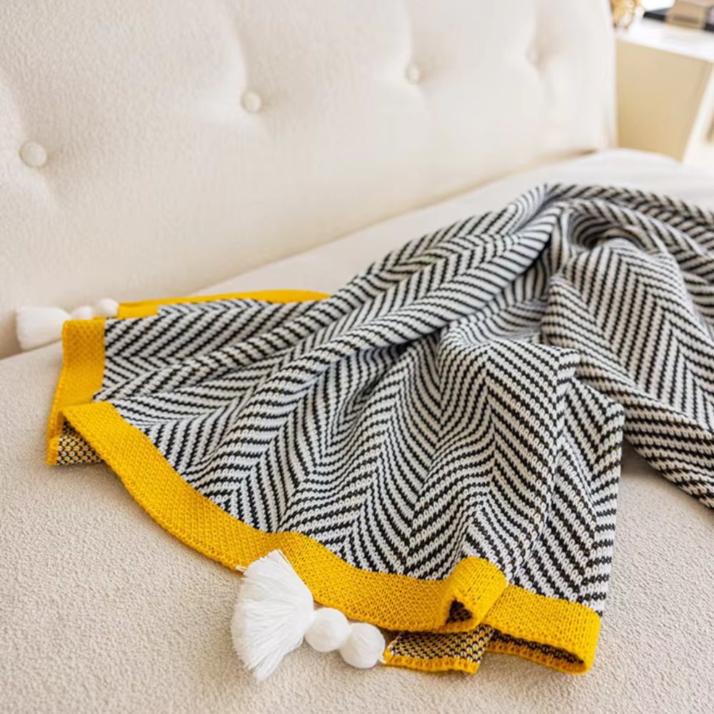Plaid luxueux à motif chevron doré