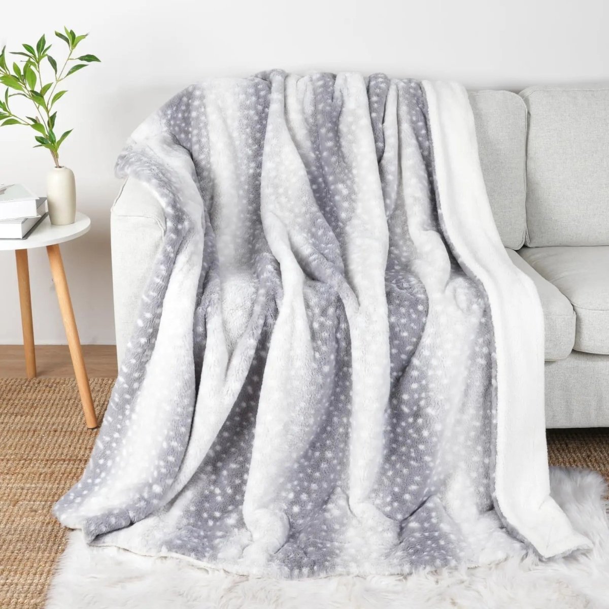 Plaid réversible en fourrure synthétique à motif de cerf avec confort peluche